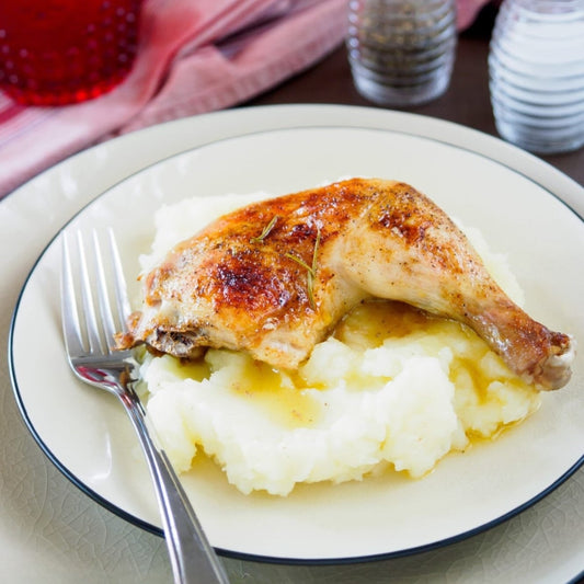 Half Chicken with mashed potatoes and gravy